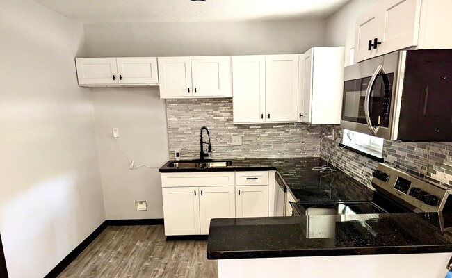 Building Photo - 5810 W Bellfort Ave Unit Efficiency Rental