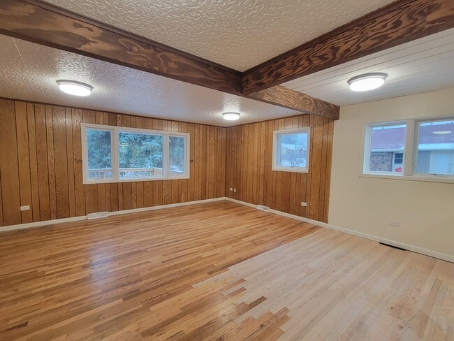 Main living area with large windows and mountain views!