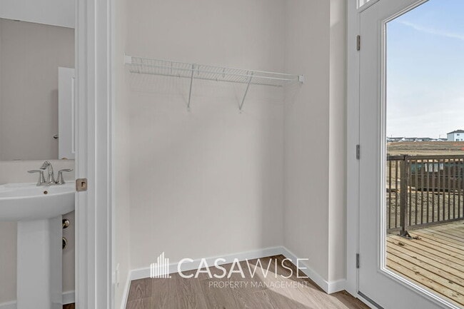 Photo - 21107-21125 25 Ave NW