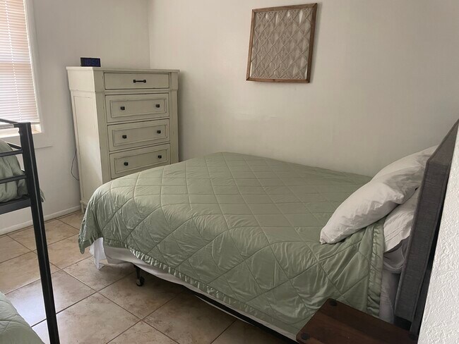 Bedroom with Queen bed and bunkbeds - 680 Carver Rd Apartment Unit Casita close to NMSU