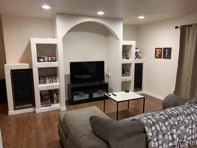 Built-in entertainment center in living room - 835 Royal Septor Way