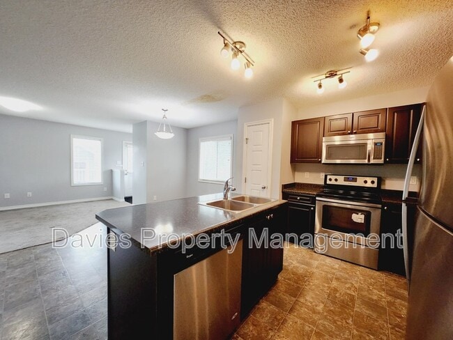 Photo - 21912-21990 90 Ave NW