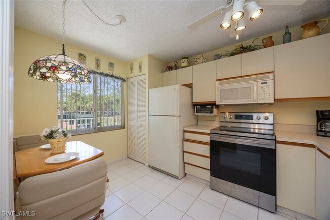 Building Photo - 5980 Amherst Dr Unit D202 Rental