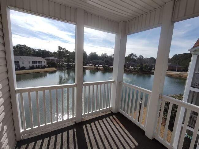 Photo - MOVE IN READY! 3rd Floor Condo with BEAUTIFUL Pond View! Central Location!