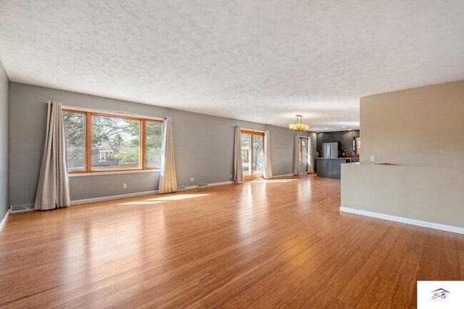 Photo - Available now! Spacious 3 Bed, 3 Bath Home with Modern Open Layout & Lawn Care Included