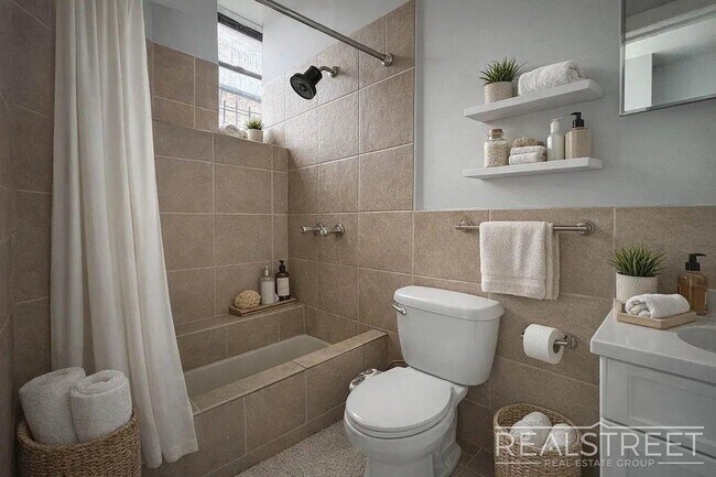 Photo - Spacious 1.5-Bedroom Penthouse Apartment in Prime Bushwick! Unit 3L