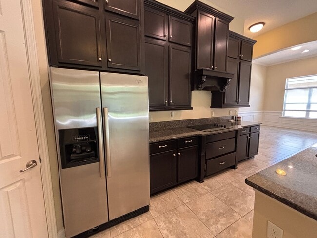 Photo - Spacious 4BR/3BA Home with 3-Car Garage, Bonus Office & Covered Patio in St Johns!