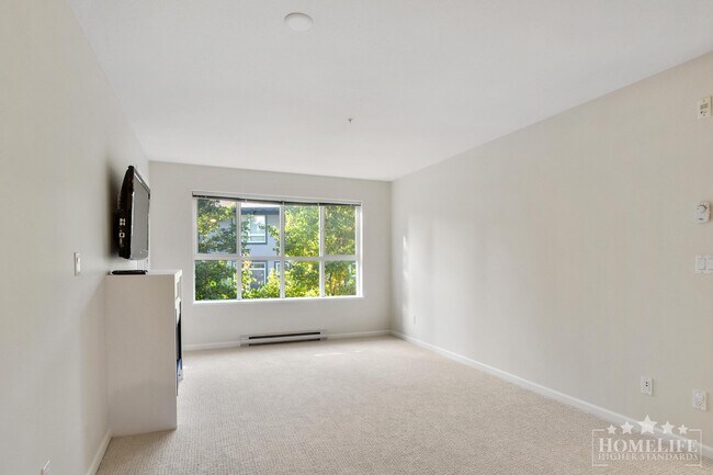 Photo - Introducing a charming 2 bed, 2 bath condo with a spacious patio fit for entertaining - Located ... Unit 209