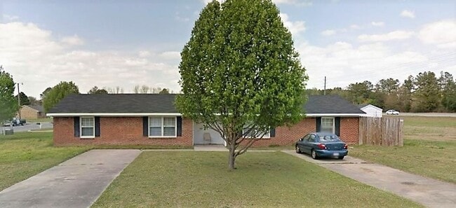 Building Photo - Serenity ViIllage Unit 100-B