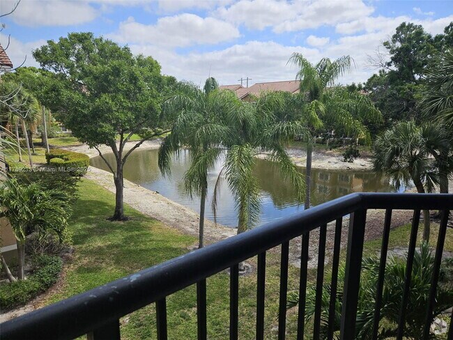 Building Photo - 8977 Wiles Rd Unit 304 Rental