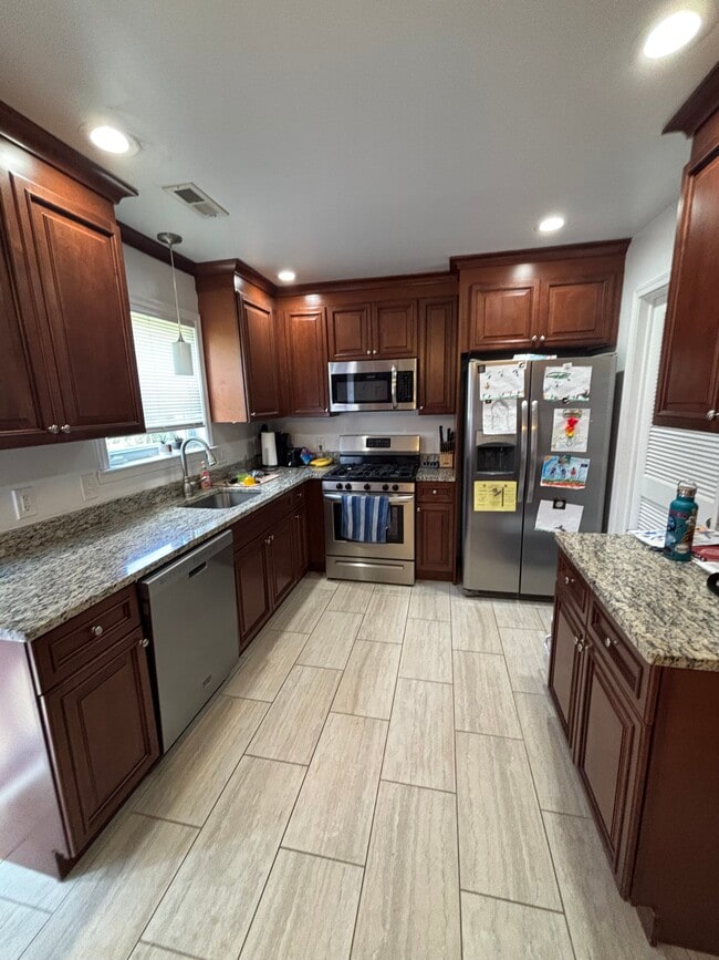 Kitchen with Stainless Steel Appliances and Granite Countertops - 34 Eaves Mill Rd