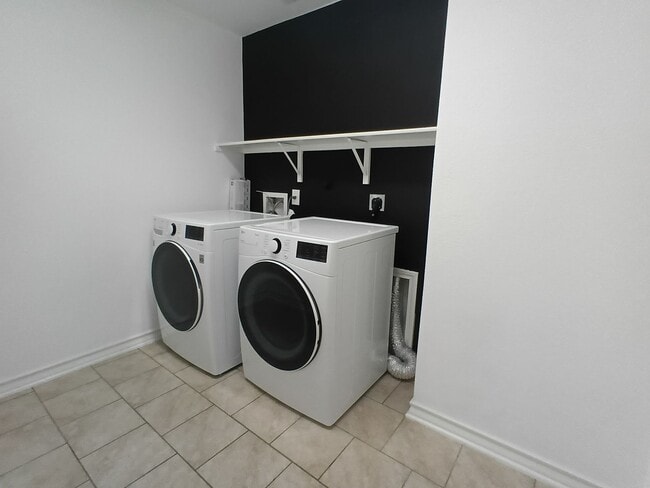 Photo - Spacious 4-Bedroom Home with Washer & Dryer Included in Riposa Vita Community!