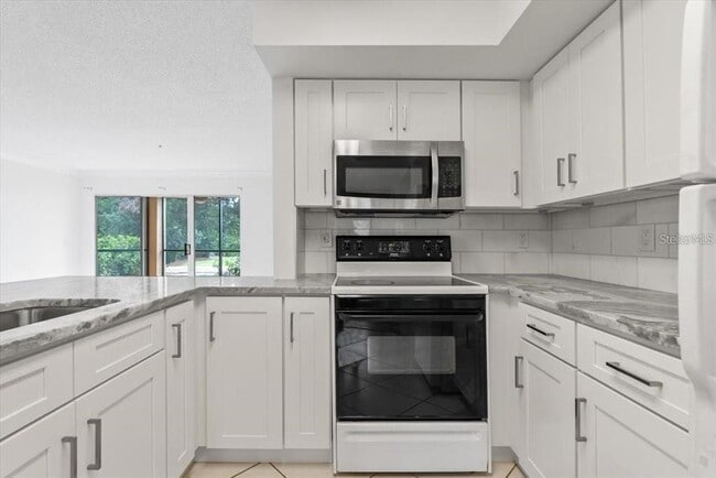 Photo - 2400 Feather Sound Dr Unit 1012