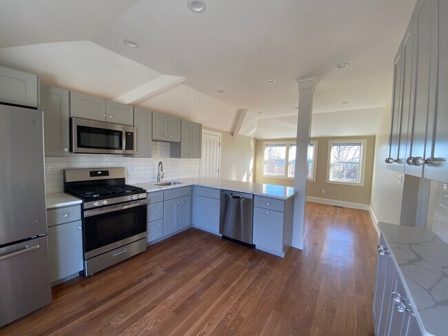 kitchen and living room - 355 Hatherly Rd Unit carriage hse apt-utils in