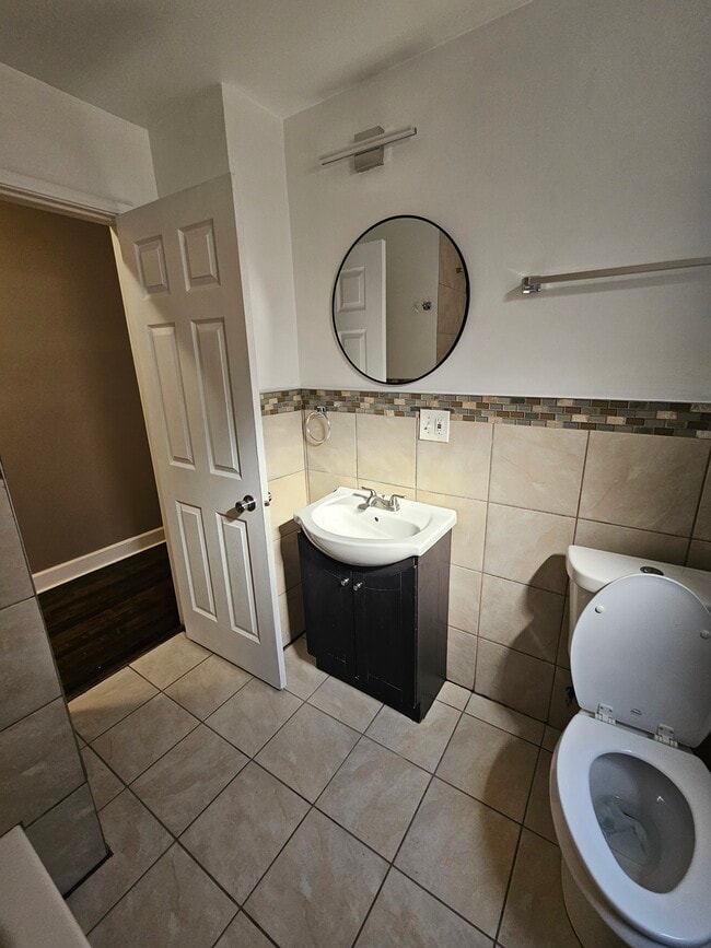 Photo - 8539 S Colfax Ave Unit First Floor  1