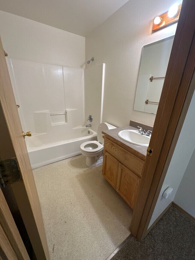 Photo - Townhouse Close to COCC! All Appliances, W/D Hook-up, Attached Garage, Water/Sewer paid!
