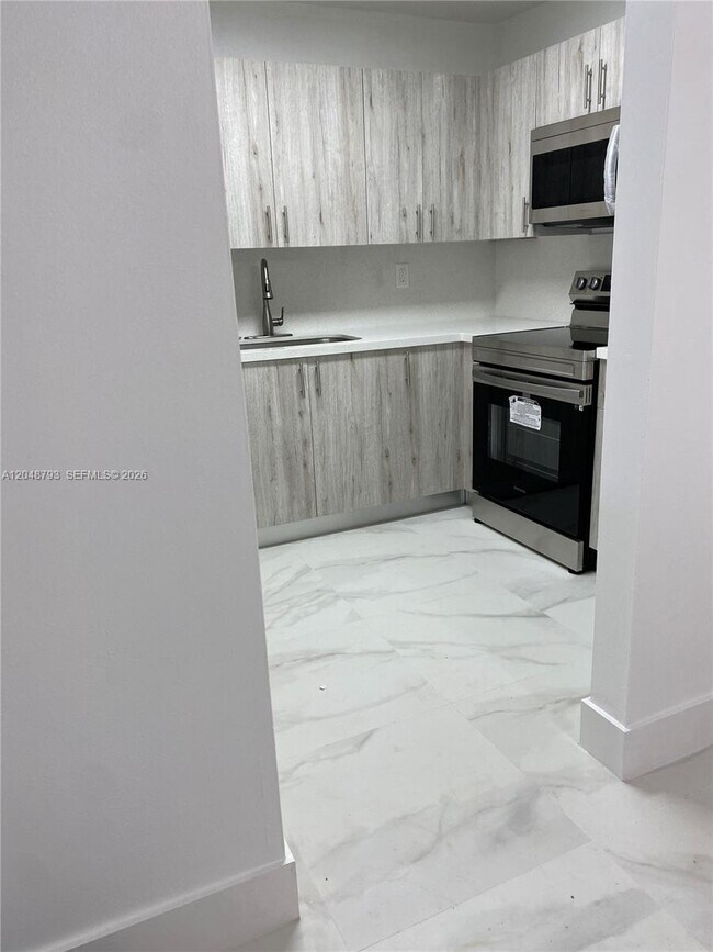 6190 W 19th Ave Unit 206