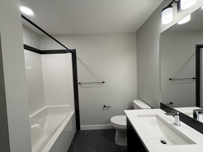 Photo - 15864-15827 27 Ave SW