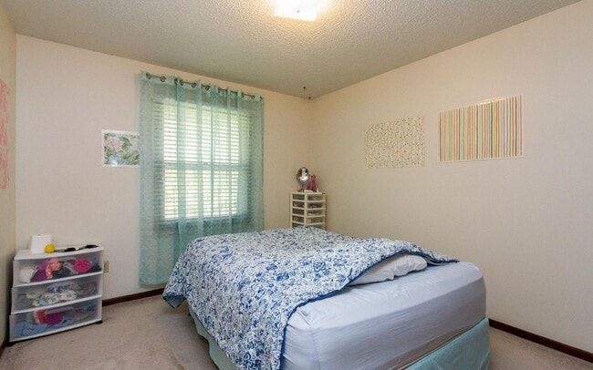 Photo - Clean three bedroom one bath duplex with walk out basement looking at trees, across from park