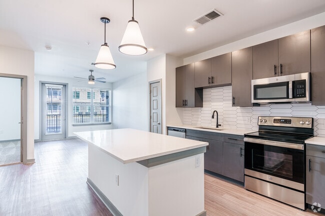 A1 1BR, 1BA - Cocina y sala de estar 776SF2