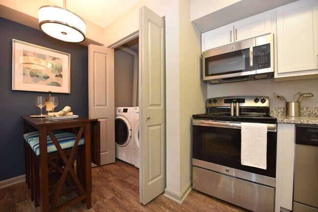 Kitchen, dining area, & laundry room