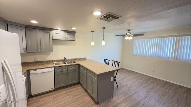 Building Photo - 4418 N 53rd Ln Unit 3