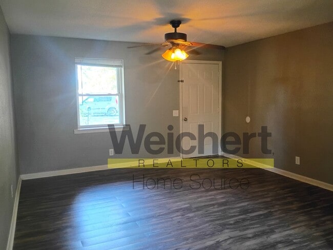 Photo - Charming 3-Bed Home with Fenced Yard and C...