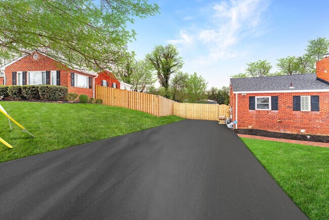 Right half of the driveway included in rent - 3233 Apex Cir Unit #B