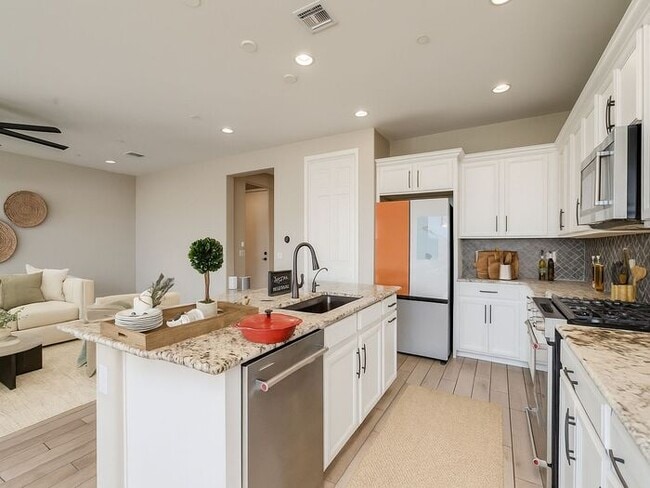 Photo - Amazing 4BR 2.5BA Home w/ 3-Car Tandem Garage • Pool Access • Yard w/ Fire Pit in Saguaro Trails