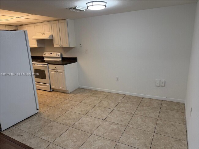 11101 Royal Palm Blvd Unit 203