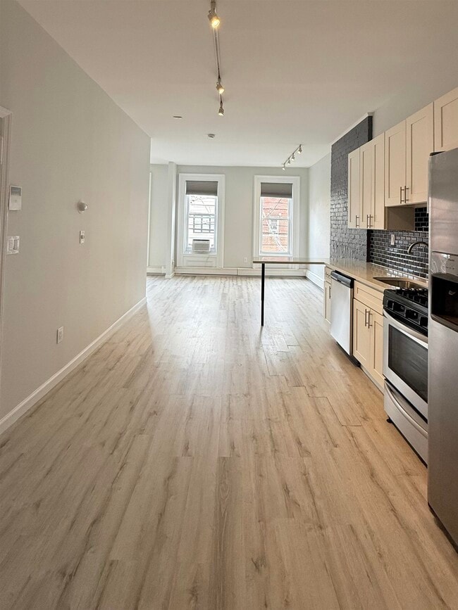 Building Photo - 332 Communipaw Ave Unit 2 Rental