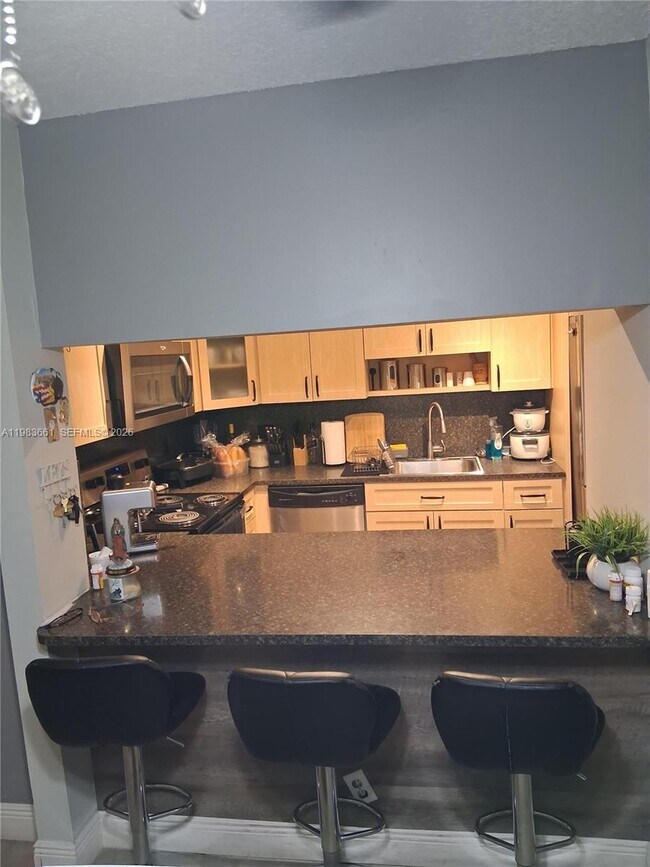 Photo - 9450 Live Oak Pl Unidad 408