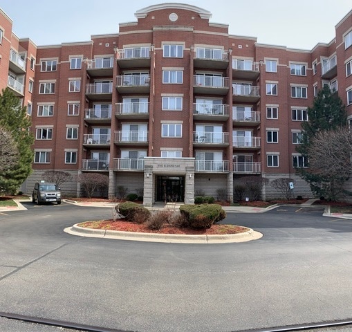Building Photo - 6560 W Diversey Ave Unit 316D