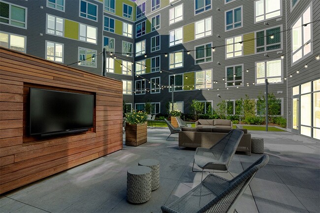 Welcoming common areas inside and out - Velo Forest Hills Apartments