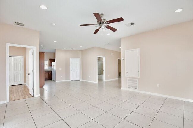 Photo - Spacious 4/2 Home with a Large Fenced Backyard and a 2 Car Garage Located in Buena Ventura Lakes ...