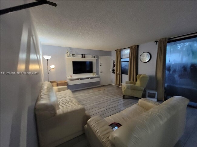 Building Photo - 1796 NW 55th Ave Unit 103