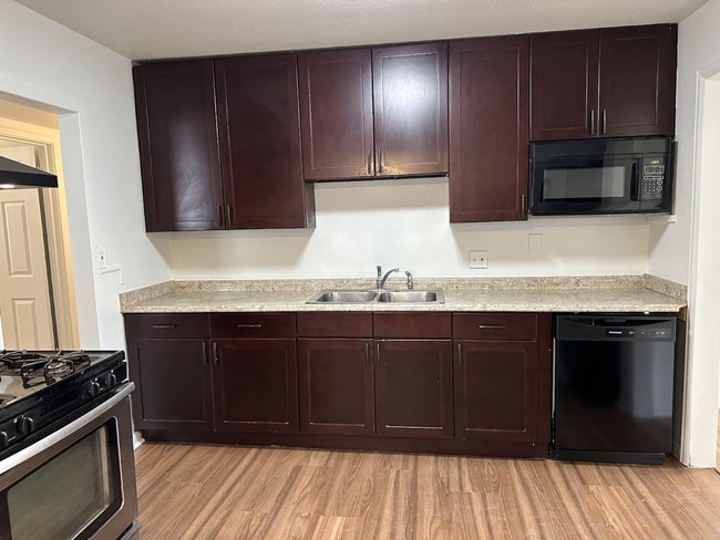 Photo - Spacious 4-Bed Home with Garage Near I-225...