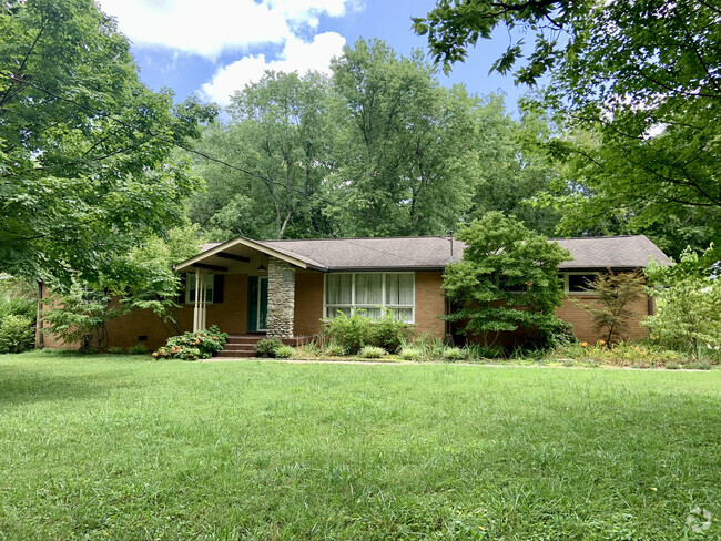 Original mid-century brick exterior - 604 Joyce Ln Rental