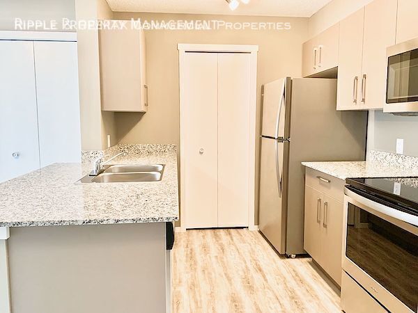 Photo - GORGEOUS 2 BED + DEN/ 2 BATH CONDO IN COMMUNITY OF SKYVIEW Unit 4411