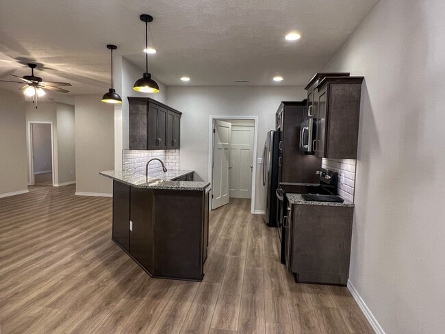 Photo - NEW LUXURY 3 BED 2 BATH 2 CAR GARAGE DUPLEX