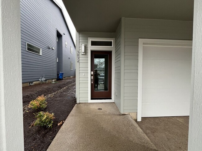 Photo - Exceptional 3-Bedroom Modern Home with Island Kitchen, Spacious Living, and Attached Garage