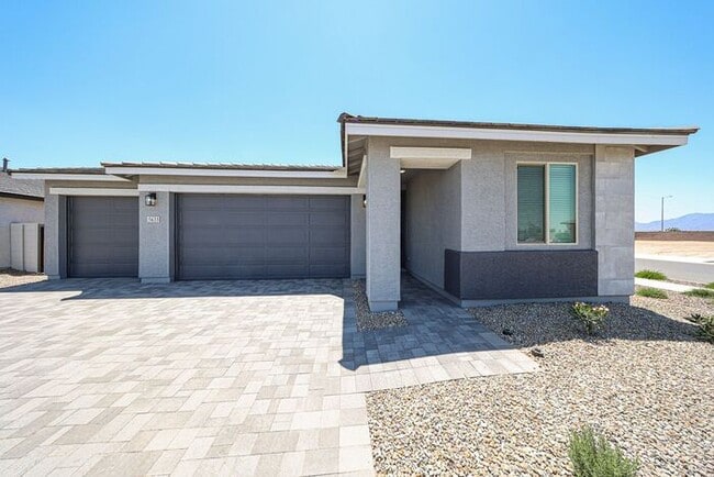 Building Photo - Modern Mountainside Living: Stunning 4-Bedroom Home in Estrella Crossing! 3 CAR GARAGE!