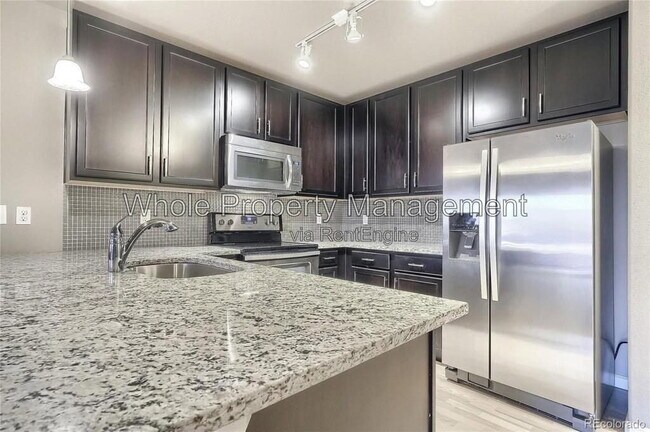 Building Photo - 9258 Rockhurst St Unit 102