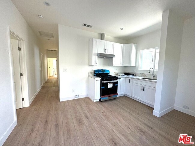 Building Photo - 1220 W 25th St Rental