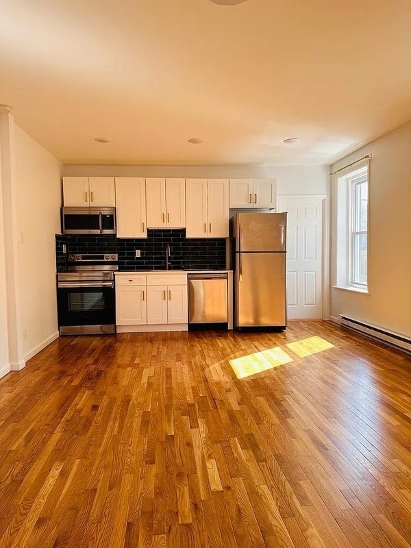 Building Photo - 6757 Germantown Ave Unit 1