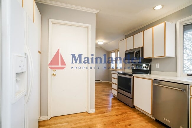 Photo - Beautiful 4 Bedroom Home with Terraced Backyard.