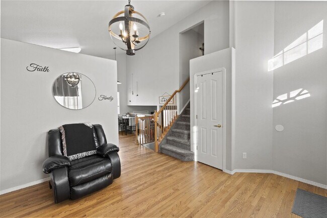 Photo - Bright & Spacious 4-Bedroom Home with Open-Concept Living, Fenced Yard & 2-Car Garage