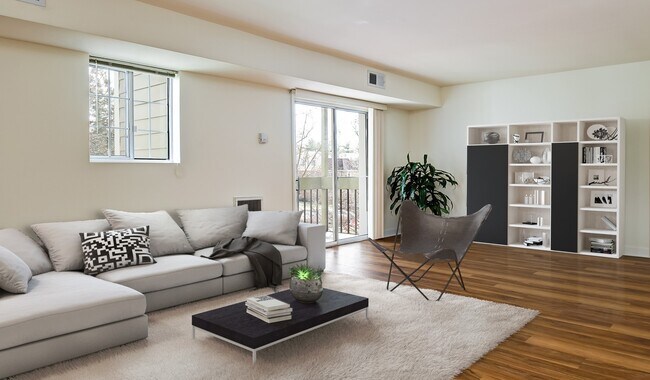 Spacious living room with vinyl wood flooring