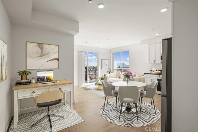 Building Photo - 11714 Archwood St Unit 203-203 Rental
