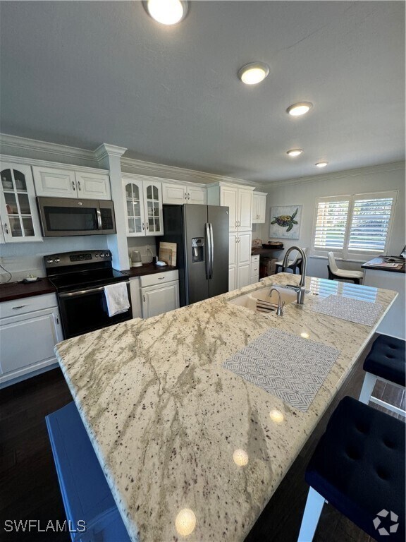 Building Photo - 5975 Bloomfield Cir Unit C107 Rental